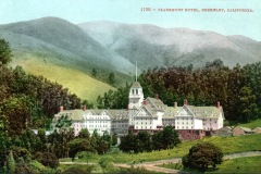 Historic hotel nestled among green hills and trees with a mountainous backdrop. The building has multiple wings, peaked roofs, and a central tower. Text at the top reads, 1700 - Claremont Hotel, Berkeley, California.