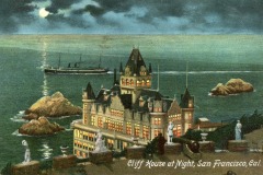 Illustrated postcard of San Francisco’s Cliff House at night, with glowing windows, a ship on the ocean, rocky shoreline, and a full moon illuminating the sky. The text reads: Cliff House at Night, San Francisco, Cal.