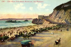 Vintage postcard illustration of Cliff House in San Francisco, showing a busy beachside road with early automobiles, carriages, people strolling, and cliffs overlooking the ocean at sunset.