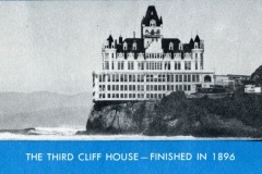 A historic black-and-white photo shows the ornate Third Cliff House perched on a rocky cliff above the ocean in San Francisco, completed in 1896. Text at the bottom reads: THE THIRD CLIFF HOUSE—FINISHED IN 1896.