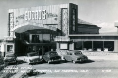Black-and-white photo of Sutro’s, a historic building near Cliff House with an ornate sign, vintage cars parked in front, and text reading “Fabulous Sutro’s at Cliff House Properties, San Francisco, Calif.”.