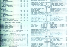 A vintage restaurant menu with a blue tint displays various sections: Wines, Fresh Fish, Vegetables, Potatoes, Desserts, and Soft Drinks. Prices are listed in dollars and cents, offering a wide variety of options.