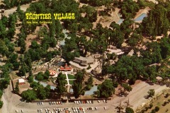 Aerial view of Frontier Village amusement park in San Jose, California, surrounded by trees, with buildings, a small striped tent, ponds, and a parking lot filled with cars. Text “Frontier Village San Jose, California” appears at top left.
