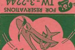 A vintage matchbook cover featuring red and green graphics for Oakland Seafood Grotto, Fisherman’s Pier. Includes a cartoon fish and net design, with text for reservations and manufacturer details.