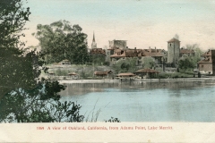 Vintage postcard showing a view of Oakland, California from Adams Point, Lake Merritt. The image features trees, historic buildings, and a church spire reflecting in the water under a clear sky.