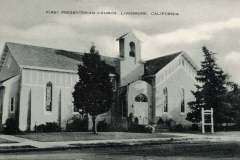 A black and white photograph of the First Presbyterian Church in Livermore, California. The church features tall windows, a small bell tower, and a gabled roof. Trees flank the building, and a sign is visible in the front yard.