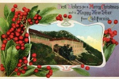 Vintage holiday postcard with a train passing a hillside building surrounded by red berries and green leaves. The text reads, Best Wishes for a Merry Christmas and a Happy New Year from California.