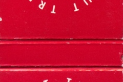 Red matchbook cover from Nut Tree, California, with a white logo showing a tree and text reading NUT TREE CALIFORNIA in circular formation. Bottom text advises, CLOSE COVER BEFORE STRIKING MATCH.