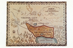 Vintage map illustrating The Ponderosa in Nevada, featuring Virginia City, Carson City, Reno, Washoe Lake, and Lake Tahoe. Decorative border and rustic illustration style. Compass rose and small mountain sketches also visible.