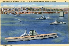 A vintage postcard illustration depicts battleships and an aircraft carrier anchored in San Francisco Bay, with the San Francisco-Oakland Bay Bridge and the citys skyline in the background.