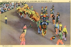 A colorful parade featuring a large, vibrant dragon costume with people underneath directing it. The event takes place in Chinatown, San Francisco, with spectators and participants dressed in festive clothing. The background is a street setting.