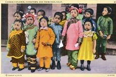 A vintage postcard shows a group of children in colorful traditional Chinese attire standing on a street in Chinatown, San Francisco. The children appear to be posing for the camera. The image caption reads, Chinese Children, Chinatown, San Francisco, Calif.
