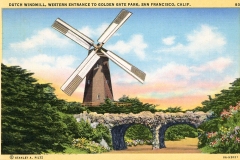 A postcard illustration of a Dutch windmill at the western entrance to Golden Gate Park, San Francisco. The windmill stands amid lush greenery with a stone bridge in the foreground under a blue sky with some clouds.
