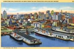 Colorful vintage postcard depicting downtown San Francisco viewed from the San Francisco-Oakland Bay Bridge. The scene includes numerous buildings, a vibrant skyline, and ships docked near piers in the foreground.