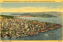 Vintage postcard illustration of downtown San Francisco and the Golden Gate Bridge. City buildings, docks, and the bridge span the bay, with rolling hills in the background. Text at the top and bottom provides details about the location.
