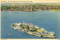 A vintage postcard illustration of Alcatraz Island in San Francisco Bay, California. The island is detailed with buildings and greenery, surrounded by water. In the background, the cityscape of San Francisco is visible across the bay.