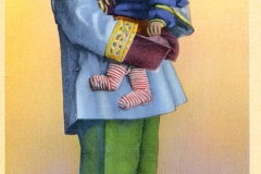 A vintage postcard shows a Chinese mother holding her baby. They are dressed in colorful traditional clothing. The mother wears a decorative top and green pants. The baby is in blue and green, with a red cap and striped socks. Text indicates Chinatown, San Francisco.