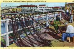 A vintage postcard illustration of fishermen mending nets at Fishermans Wharf in San Francisco. Three people focus on repairing large fishing nets. Boats and waterfront buildings are visible in the background.